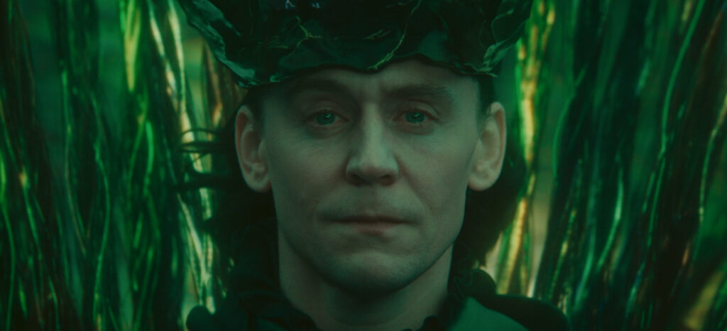 Loki in Avengers Doomsday announcement with green lighting and crown